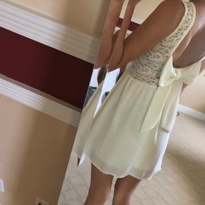 cream chiffon dress with bow and lace detailing